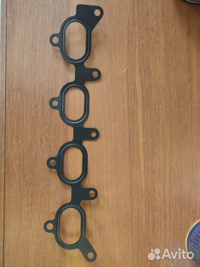 Прокладка впускного коллектора Mazda 323