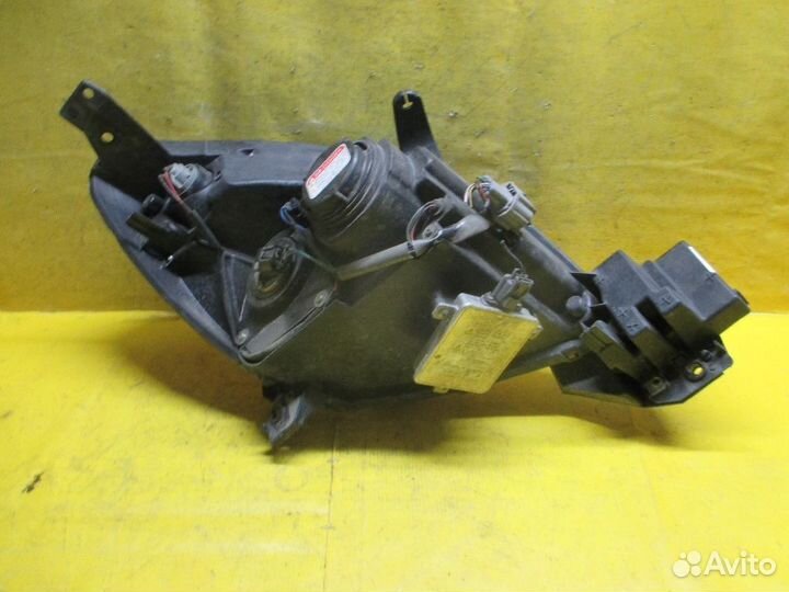 Фара левая Mazda Verisa DC5W