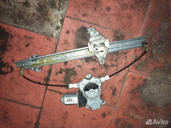 Стеклоподъемник двери передней левой Nissan Almera