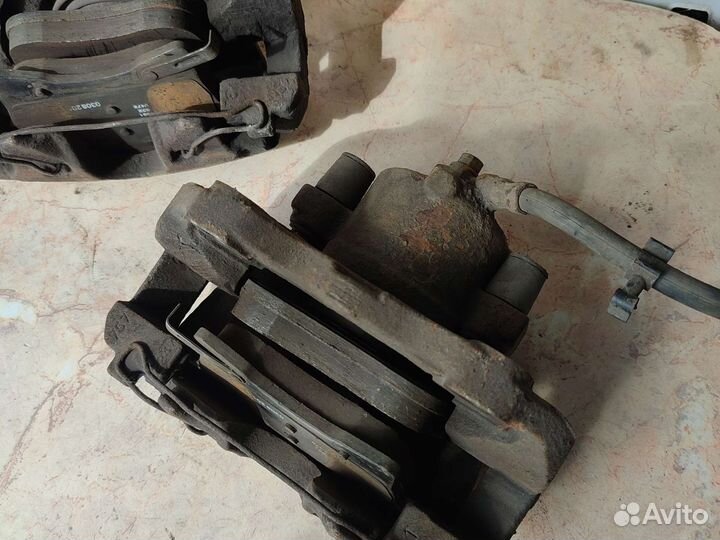 Opel astra Н тормозной суппорт