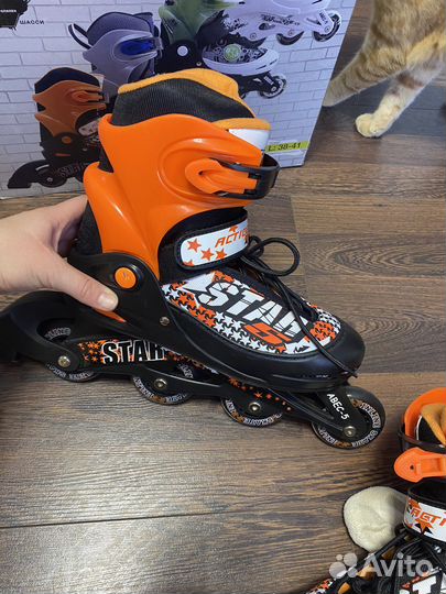 Роликовые коньки