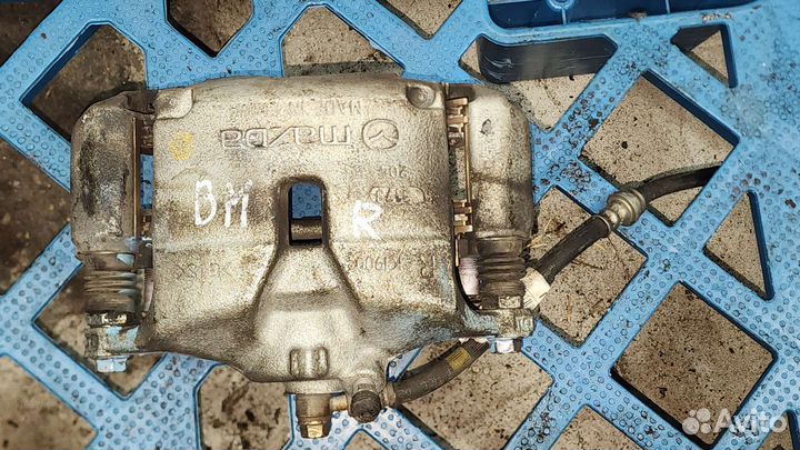 Суппорт тормозной передний правый Mazda 3 (BM/BN)