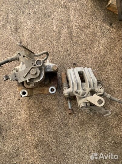 Суппорт тормозной задний Volkswagen Skoda