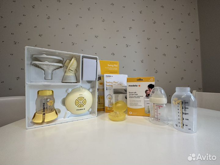 Молокоотсос medela swing flex электрический