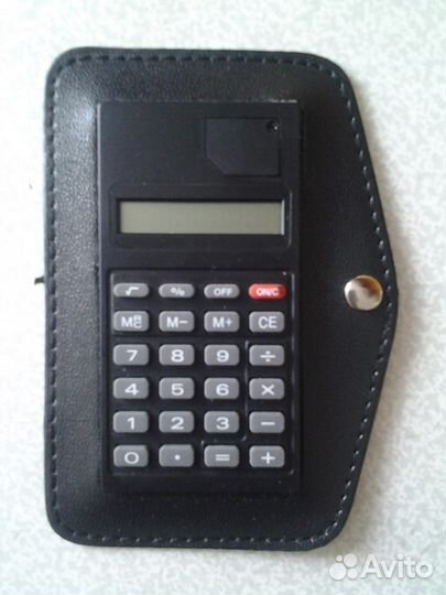 Калькулятор в кожаном футляре и защитном чехле