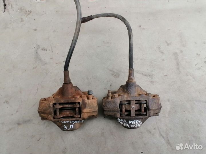 Суппорт тормозной задний Mercedes Benz 190 W201