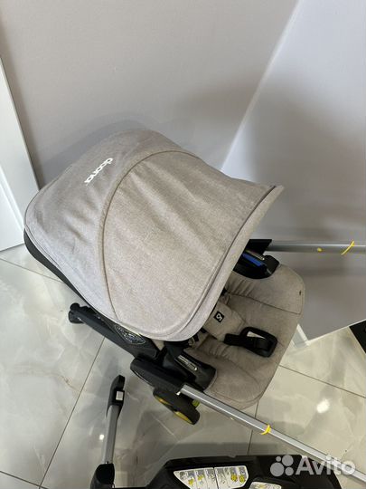 Коляска автокресло doona с базой isofix