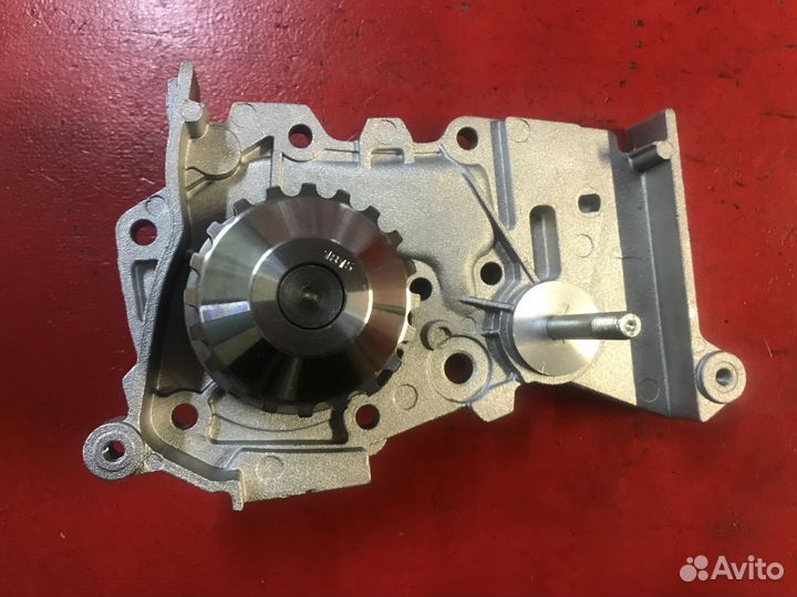 Насос водяной Renault Logan K4M 1.6