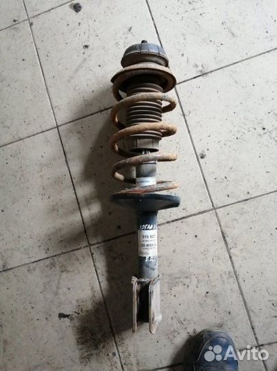 Амортизатор передний правый Renault Logan LS0G