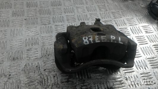 Суппорт тормозной передний левый hyundai tucson JM