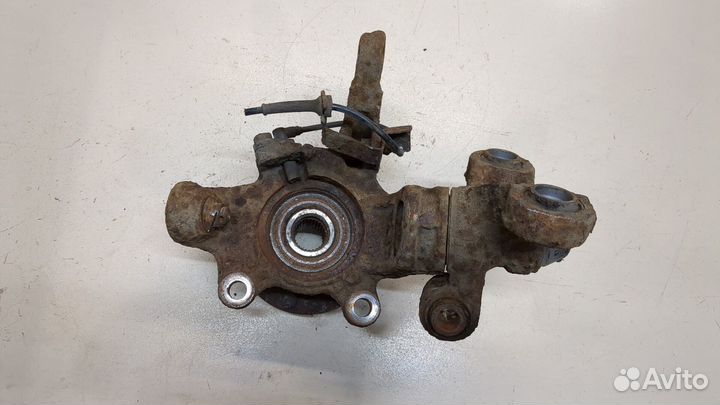 Ступица (кулак, цапфа) левая передняя Nissan Primera P12