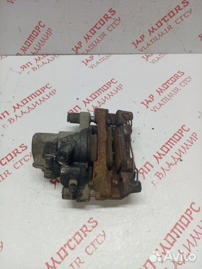 Суппорт тормозной передний правый Mazda 3 Bl