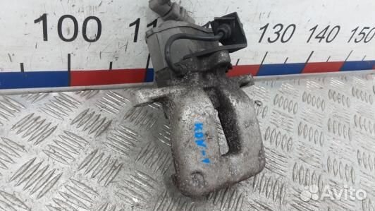 Суппорт тормозной задний левый volkswagen passat B