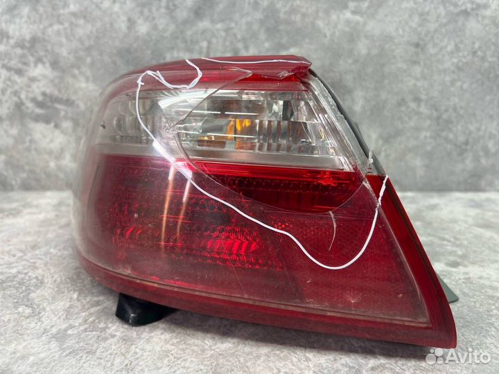 Фонарь задний наружный левый Toyota Camry XV40