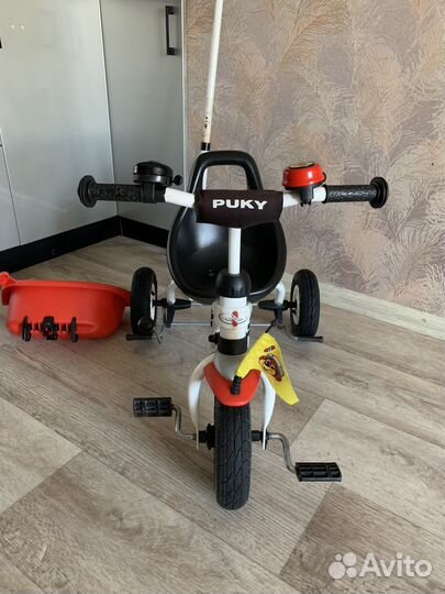 Трехколесный велосипед Puky с ручкой