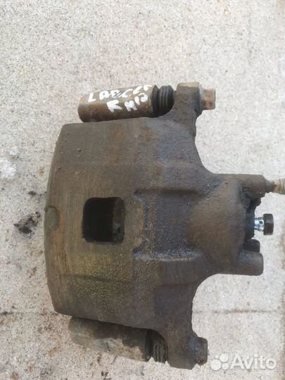 Суппорт передний правый Mitsubishi Lancer 10