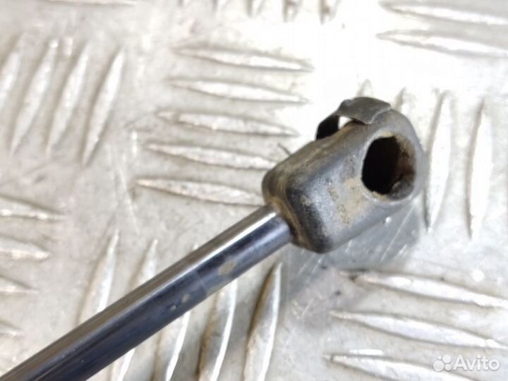 Амортизатор двери багажника Opel Astra H