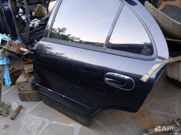 Дверь задняя левая Nissan Almera Classic