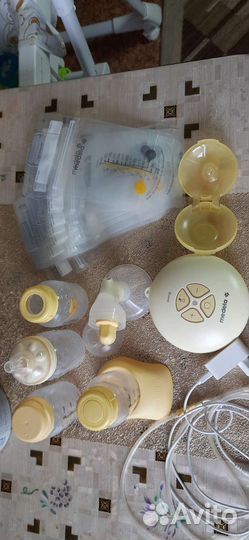 Молокоотсос medela swing