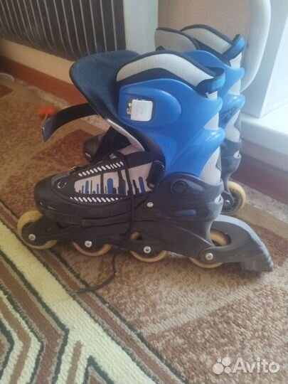 Роликовые коньки