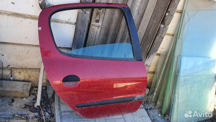 Дверь peugeot 206