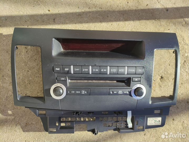 Передняя панель магнитолы Lancer X