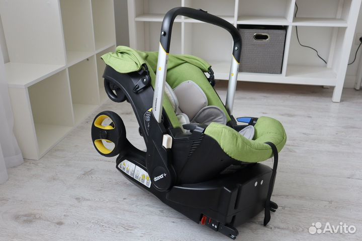 Коляска-автокресло Doona с базой isofix