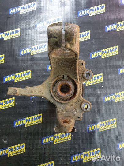 Поворотный кулак передний левый Форд Фокус 2