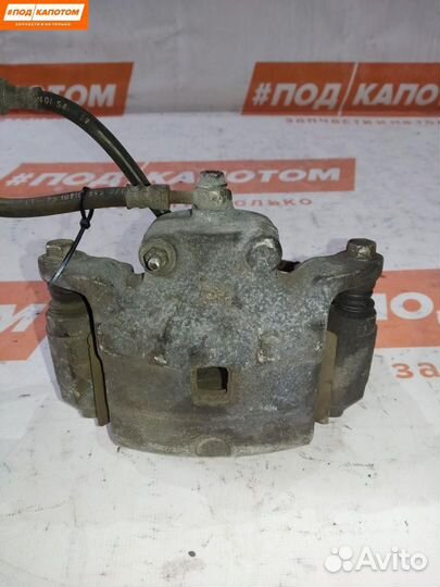 Суппорт тормозной передний правый Nissan Teana J32