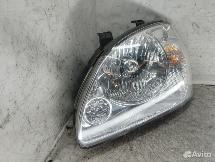 Фара левая KIA Carens 2002 - 2006 год