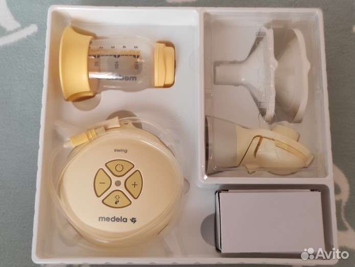 Молокоотсос medela электрический
