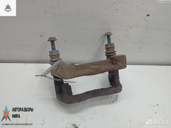 Скоба суппорта Opel Astra H/Family рест. 2005