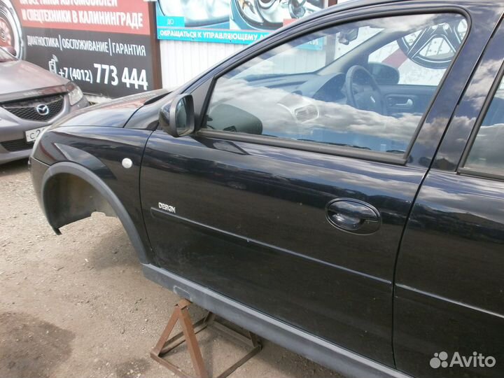 Передние двери Opel Corsa 2005г. хетч