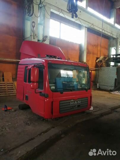 Кабина маn тга