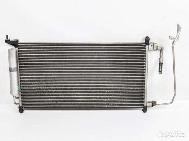 Радиатор кондиционера Mazda Familia