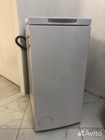 Стиральная машина с вертикальной загрузкой