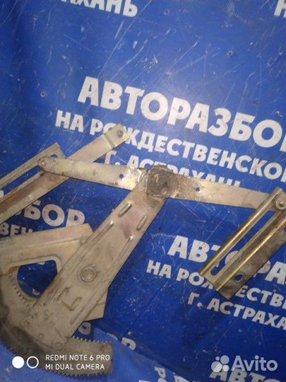 Задний левый стеклоподъёмник Газ Волга 3110 седан