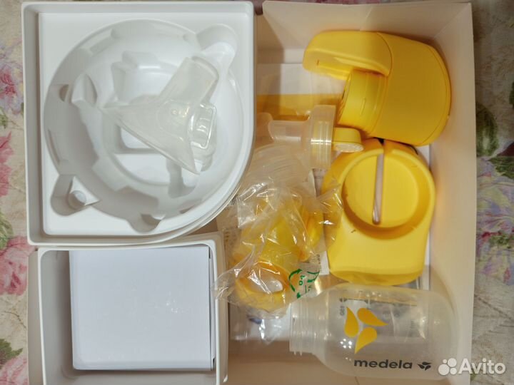 Молокоотсос medela электрический