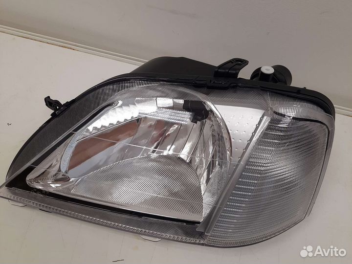 Фара левая Renault Logan 1