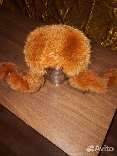 Женские меховые шапки