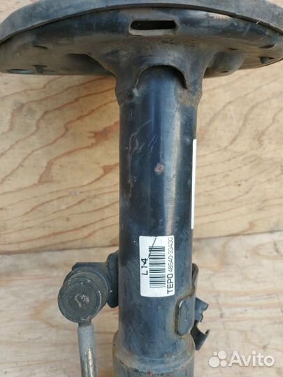 Амортизатор задний левый Toyota Camry XV40 ACV40