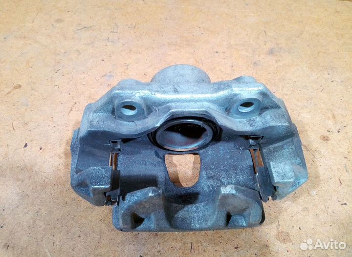 Суппорт тормозной передний правый VW Polo