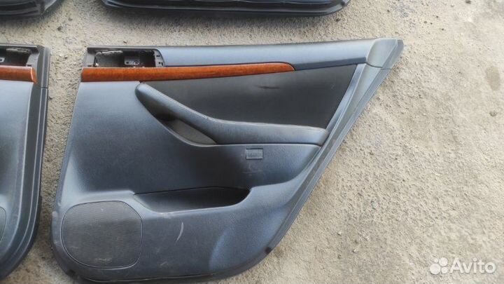 Обшивка боковой двери задняя Toyota Avensis T250