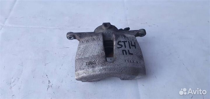 Суппорт передний левый Volkswagen Tiguan 2020