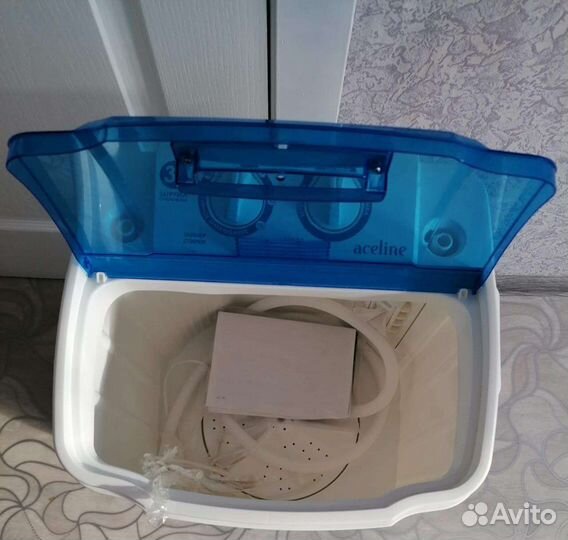 Стиральная машина с вертикальной загрузкой