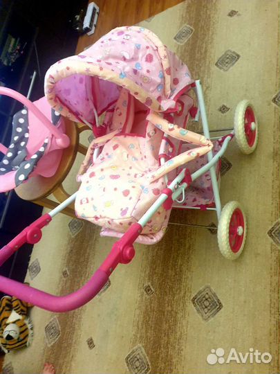 Игрушечная коляска для кукол