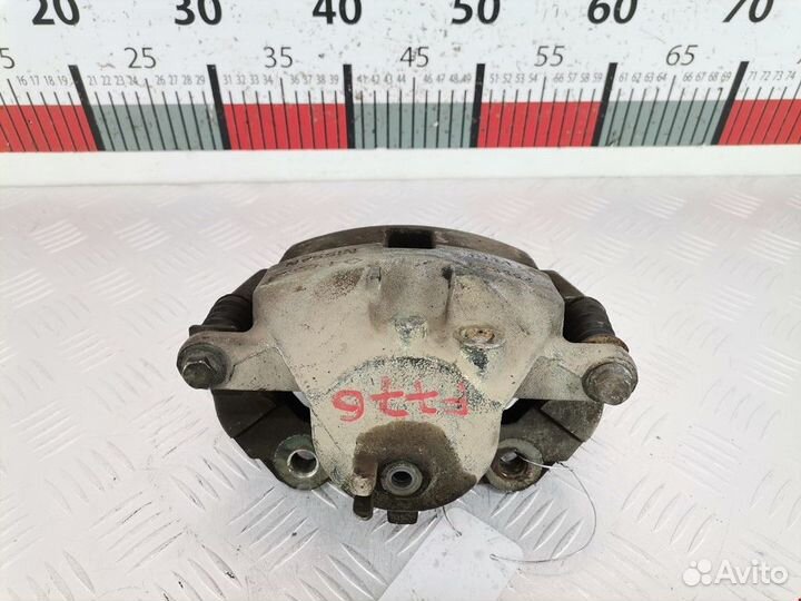 Суппорт передний правый Nissan Primera P11 рест