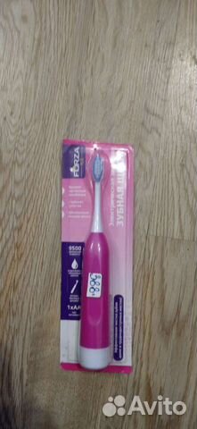 Электрическая зубная щетка