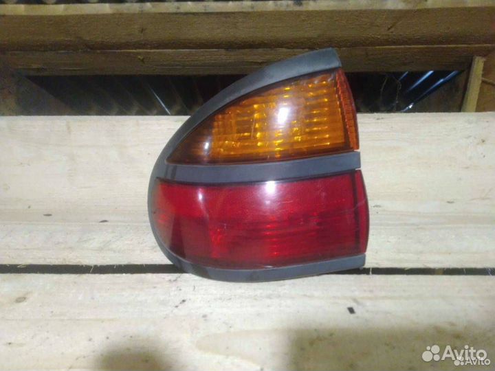 Фонарь задний левый Renault Laguna 7700420122
