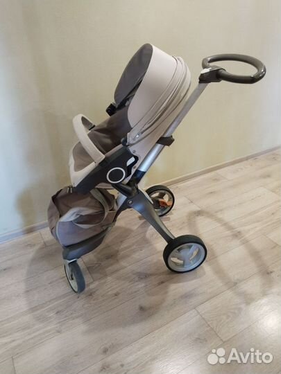 Коляска стокке stokke